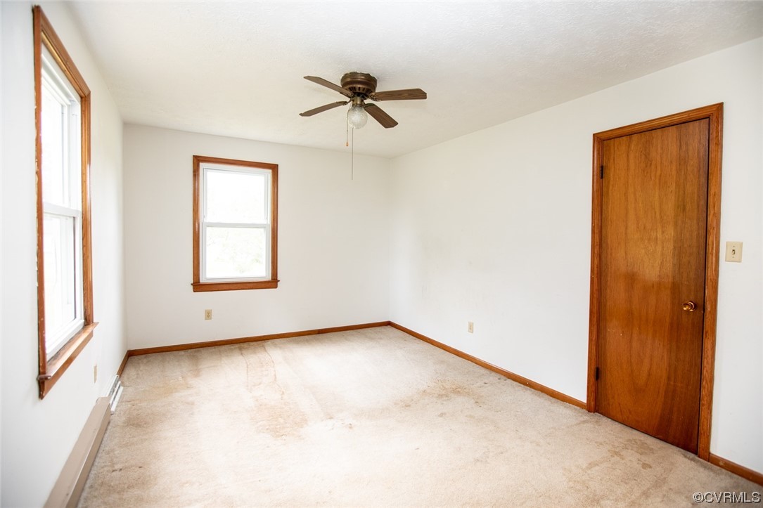 71 Spillman Road Farmville, VA 23901 - Photo 17 of 48 an empty room with windows