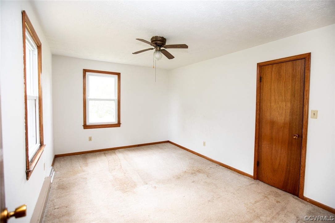 71 Spillman Road Farmville, VA 23901 - Photo 19 of 48 an empty room with windows and closet