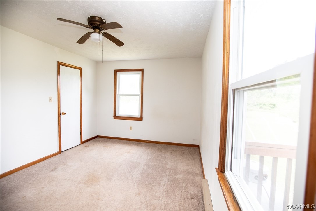 71 Spillman Road Farmville, VA 23901 - Photo 21 of 48 a view of room with a ceiling fan and window