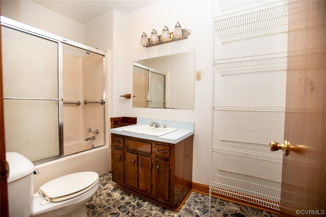 71 Spillman Road Farmville, VA 23901 - Photo 28 of 48 a bathroom with a sink a toilet a mirror and shower