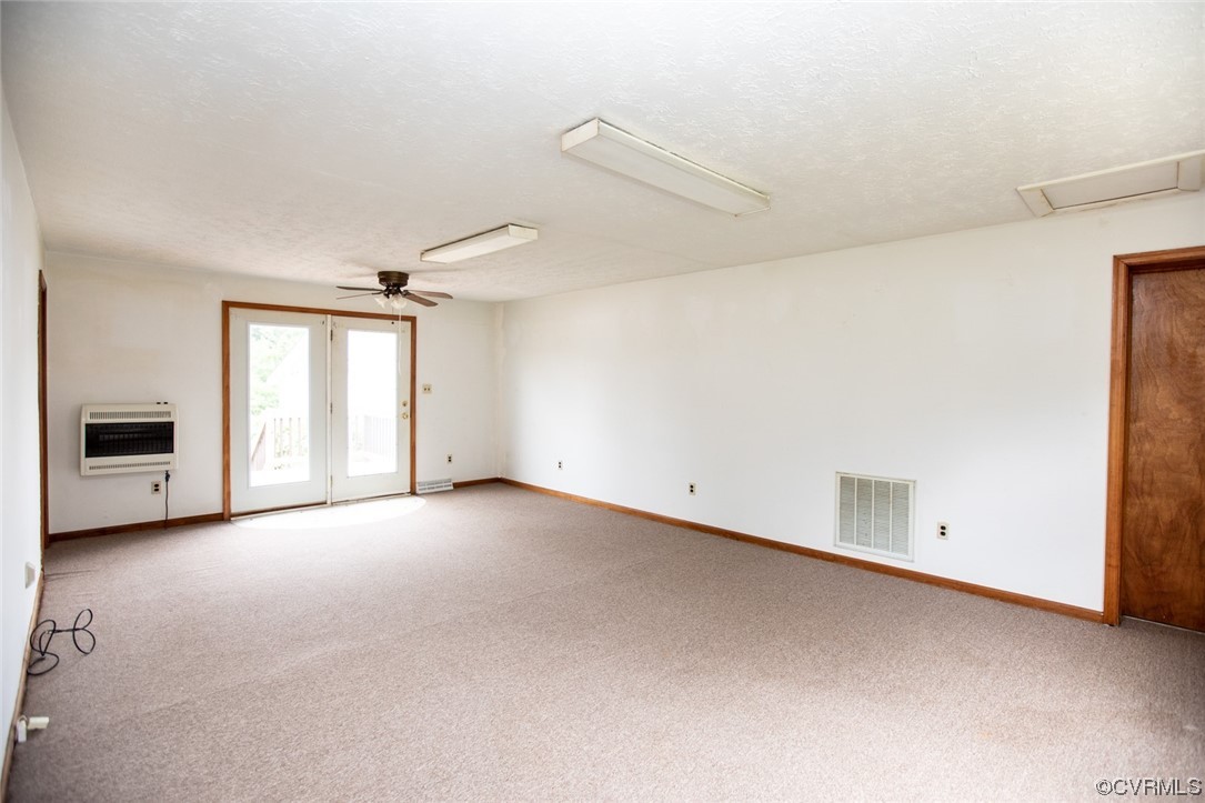 71 Spillman Road Farmville, VA 23901 - Photo 29 of 48 a view of an empty room with a window