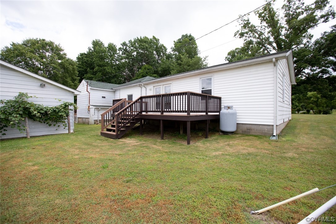71 Spillman Road Farmville, VA 23901 - Photo 36 of 48 a view of a wooden deck with a backyard