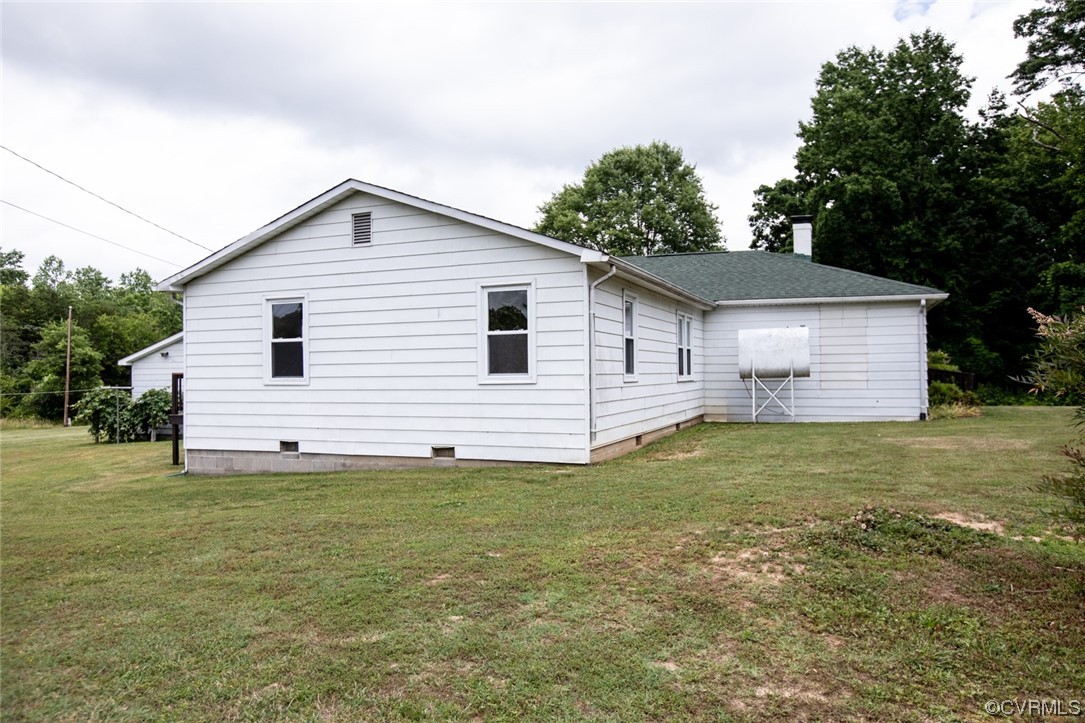 71 Spillman Road Farmville, VA 23901 - Photo 48 of 48 a view of a backyard with plants and large tree