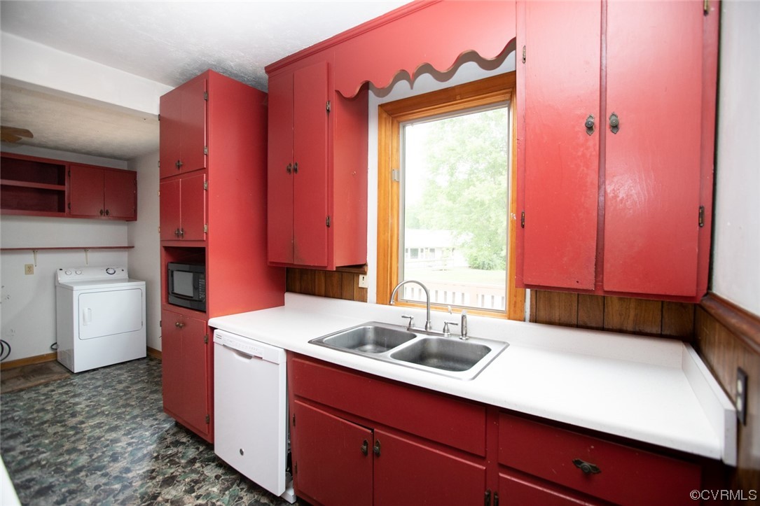 71 Spillman Road Farmville, VA 23901 - Photo 10 of 48 a kitchen with a sink cabinets and a stove top oven