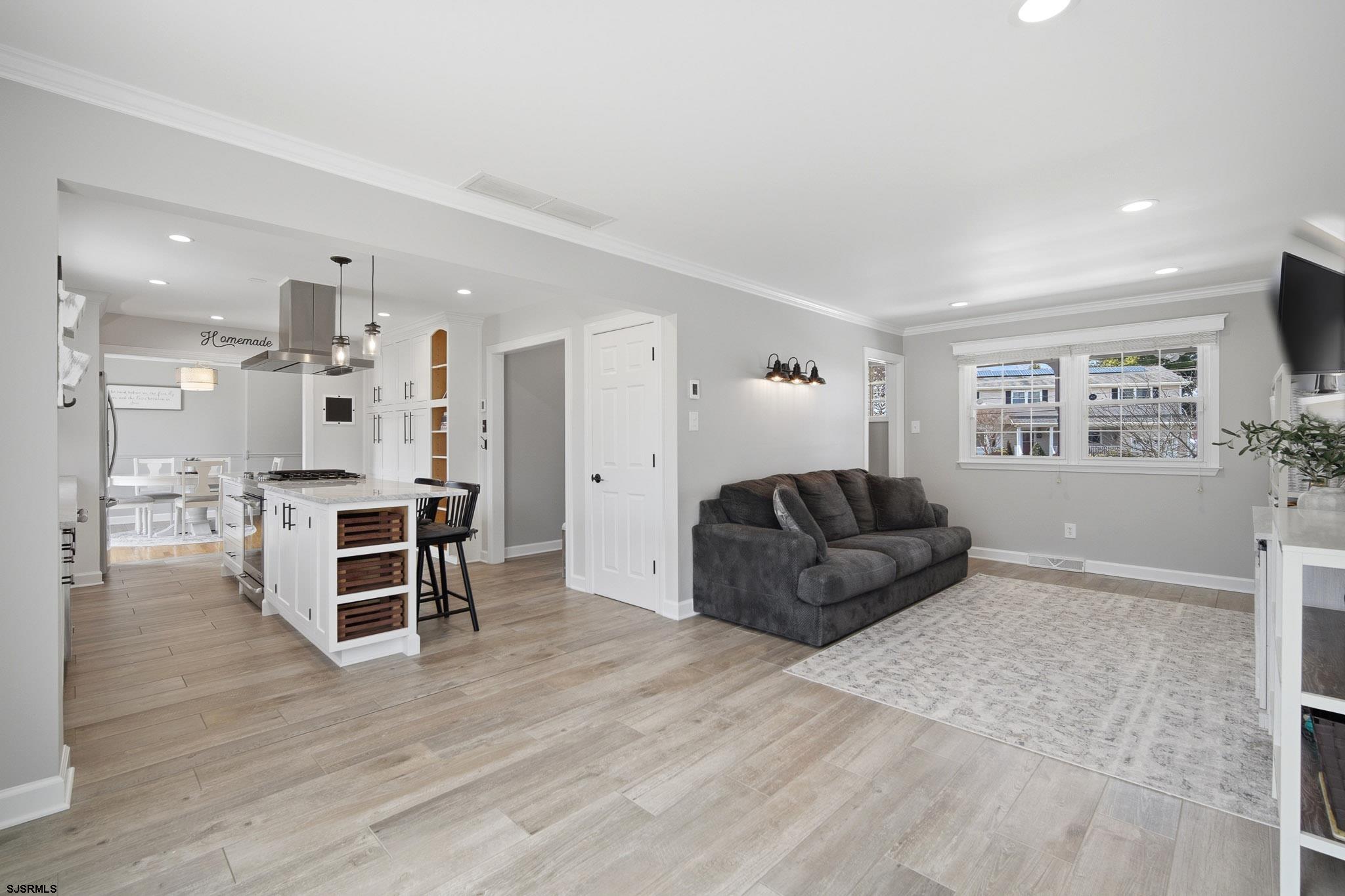2104 Grove Road Northfield, NJ 08225 - Photo 11 of 33 a living room with furniture and a wooden floor
