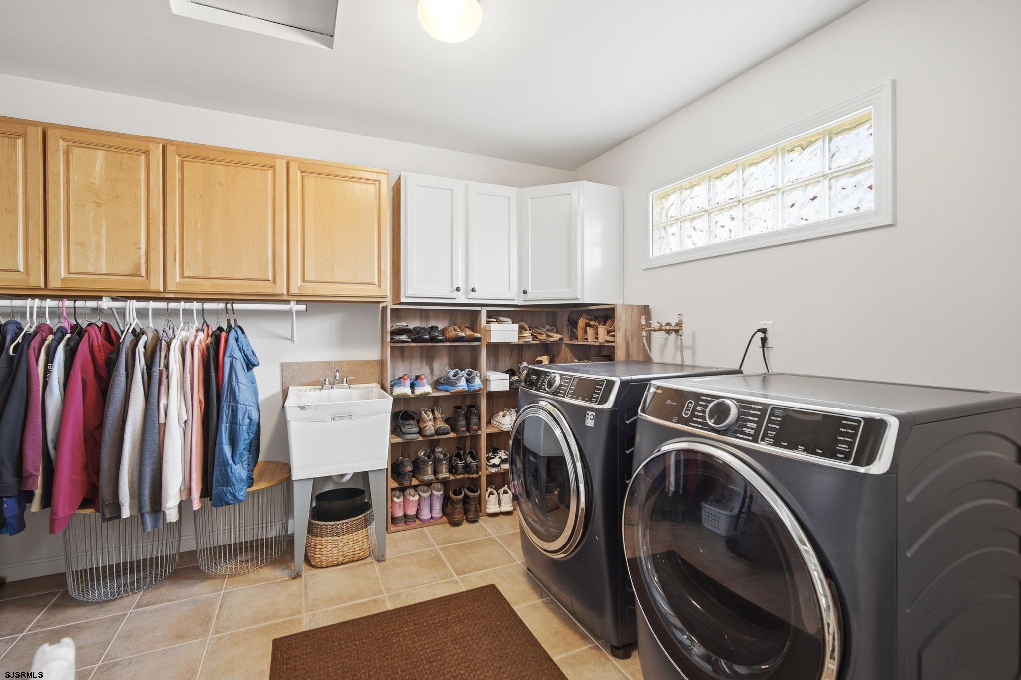 2104 Grove Road Northfield, NJ 08225 - Photo 20 of 33 a view of walk in closet with clothes