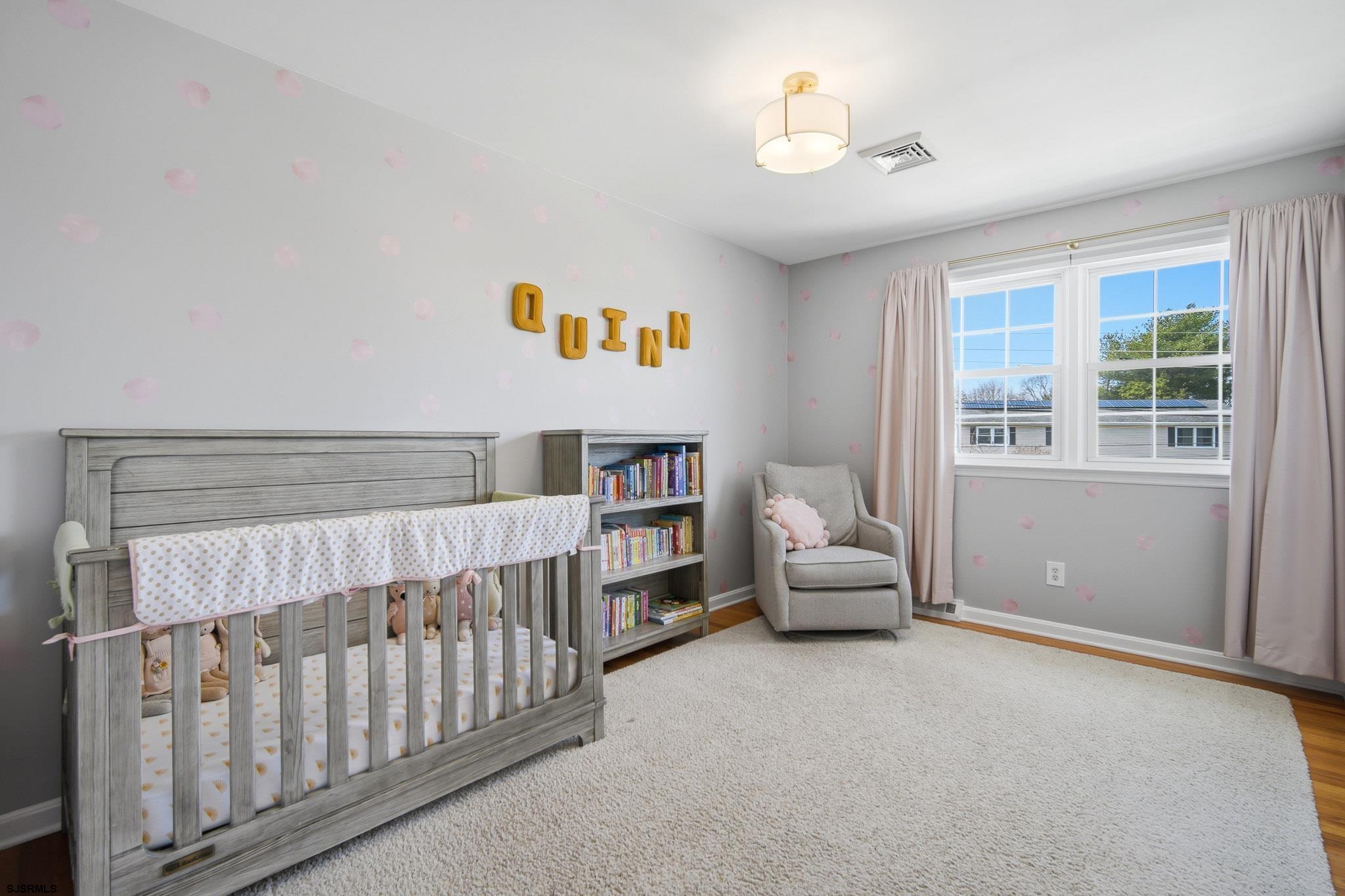 2104 Grove Road Northfield, NJ 08225 - Photo 24 of 33 a bedroom with furniture and a window