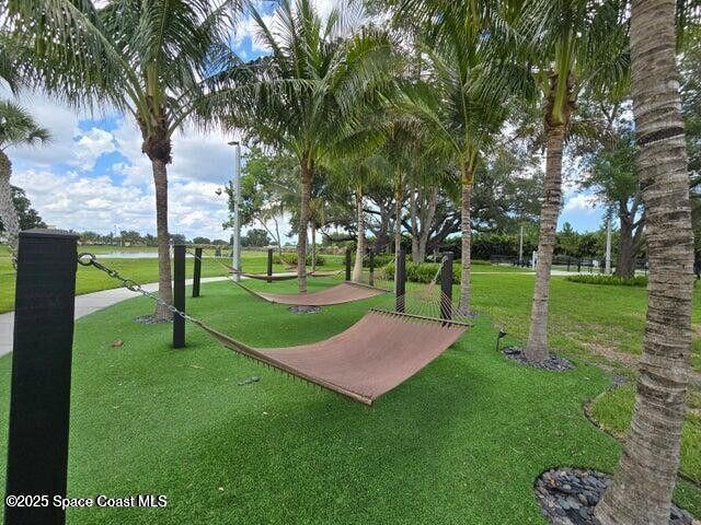 2750 Bosque Circle, Unit 304 Melbourne, FL 32940 - Photo 17 of 18 a view of a park with tree s