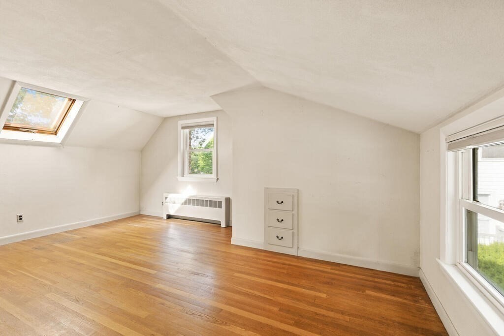 92 Middle Street Lexington, MA 02421 - Photo 18 of 25 an empty room with windows and closet