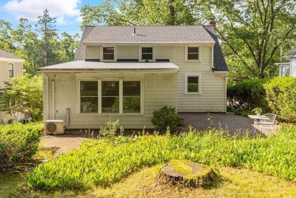 92 Middle Street Lexington, MA 02421 - Photo 21 of 25 a front view of a house with a yard