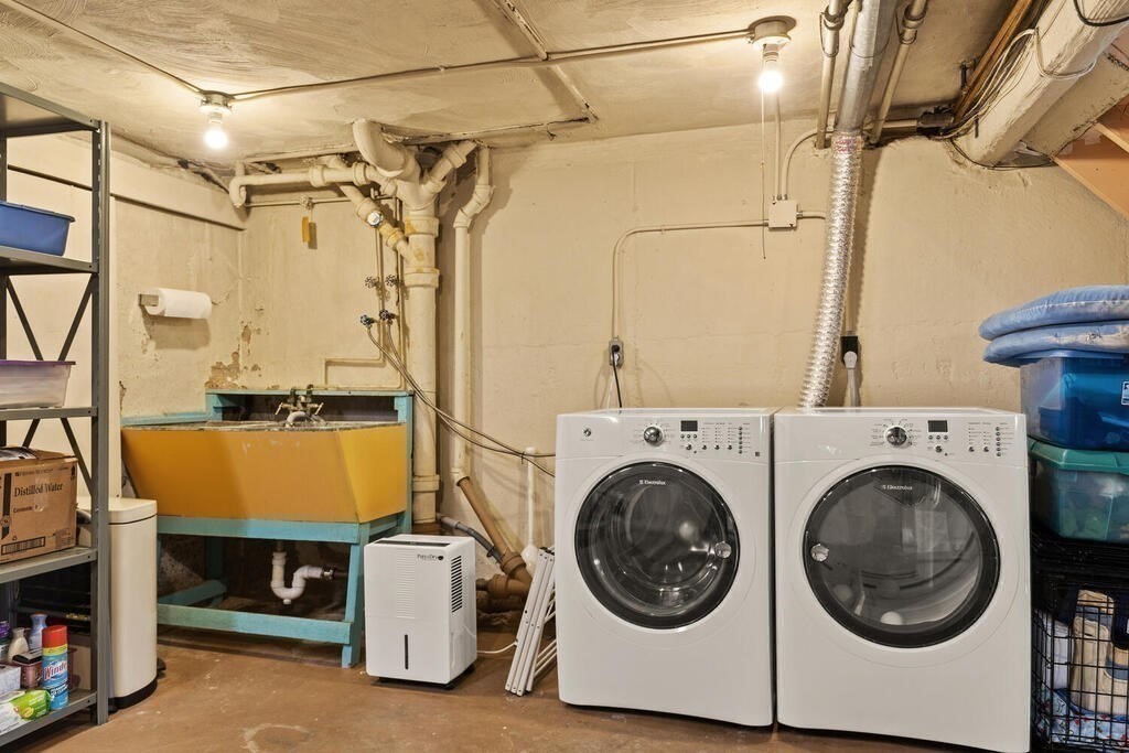 92 Middle Street Lexington, MA 02421 - Photo 22 of 25 a utility room with dryer and washer