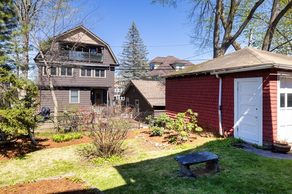 71 Congreve Street, Unit 2 Boston, MA 02131 - Photo 12 of 12 a front view of a house with garden