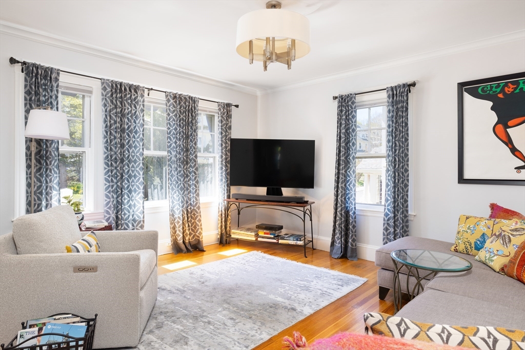 71 Congreve Street, Unit 2 Boston, MA 02131 - Photo 4 of 12 a living room with furniture and a flat screen tv