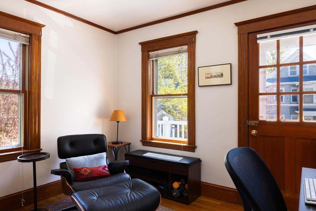 71 Congreve Street, Unit 2 Boston, MA 02131 - Photo 5 of 12 a living room with furniture and a window