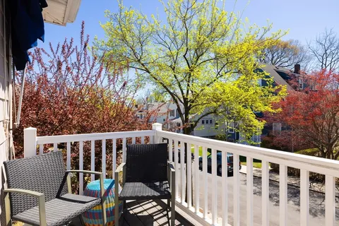 a view of a chair in wooden deck
