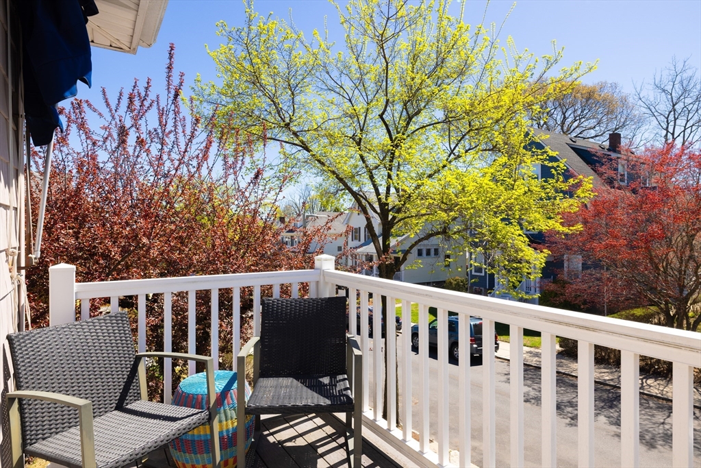 71 Congreve Street, Unit 2 Boston, MA 02131 - Photo 6 of 12 a view of a chair in wooden deck