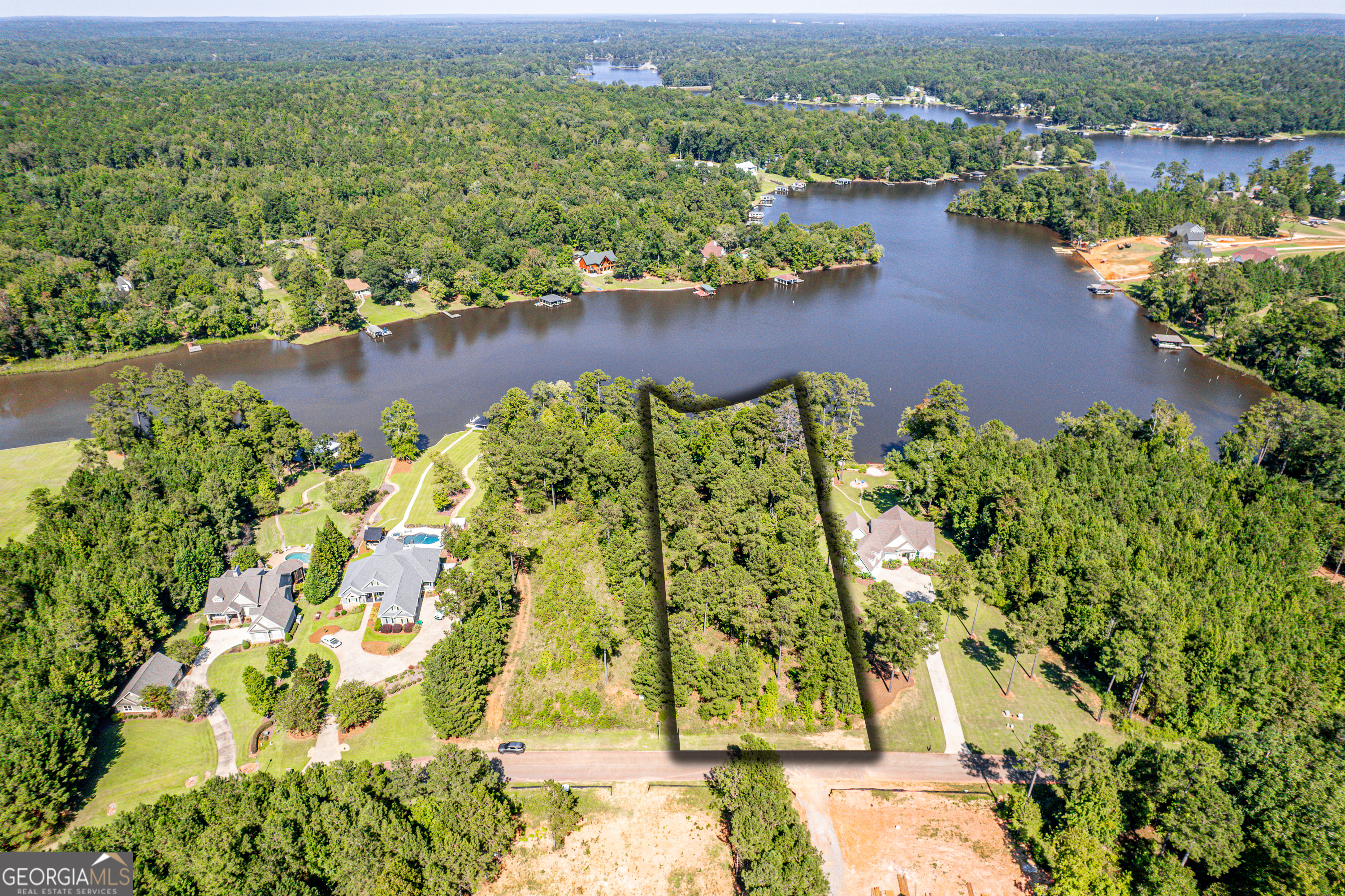 642 Parham Road Northwest Milledgeville, GA 31061 - Photo 4 of 12 an aerial view of residential houses with outdoor space and river