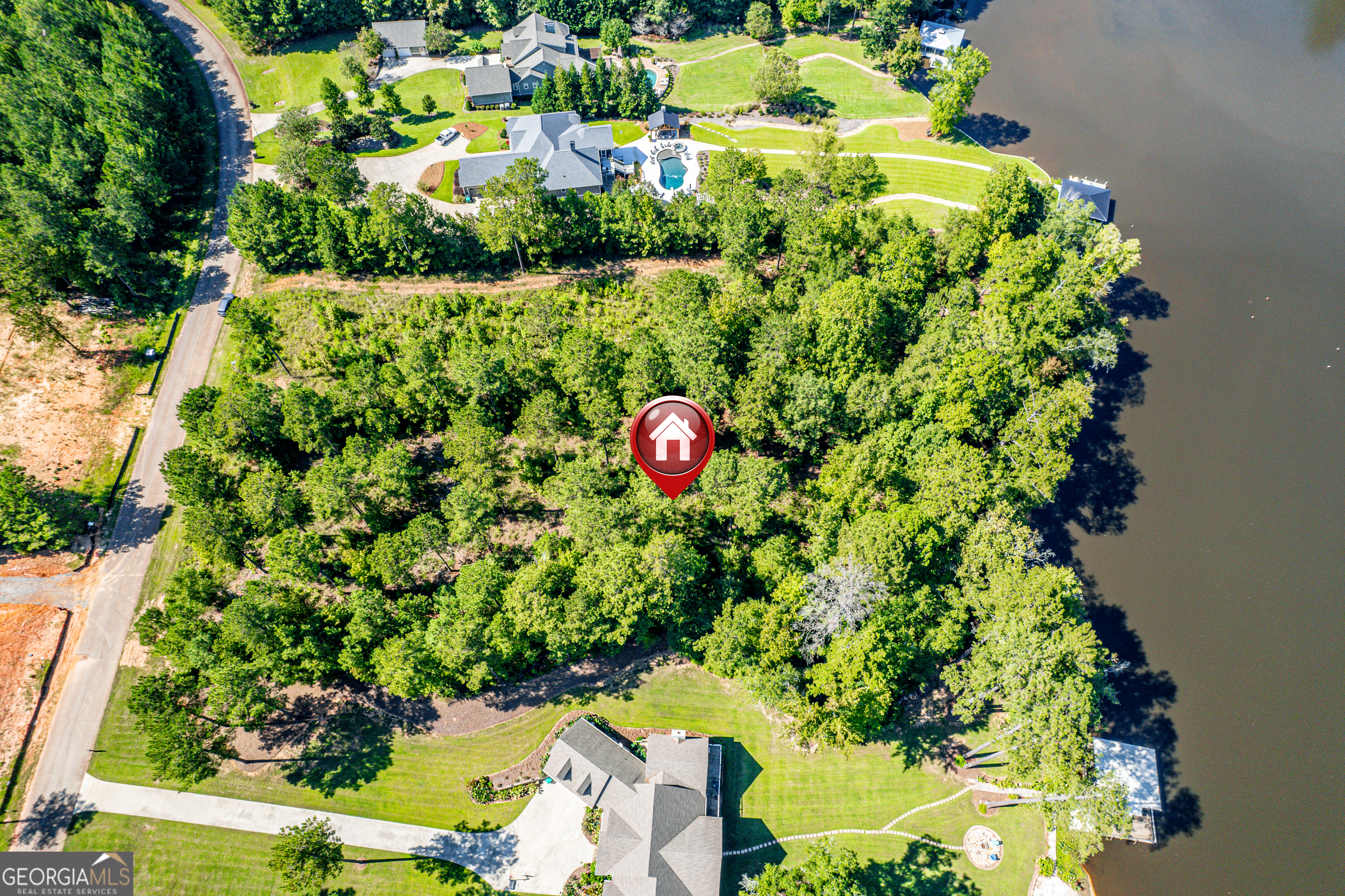 642 Parham Road Northwest Milledgeville, GA 31061 - Photo 8 of 12 an aerial view of residential house with outdoor space and trees all around