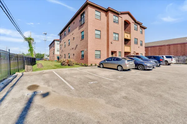 a car parked in front of a building