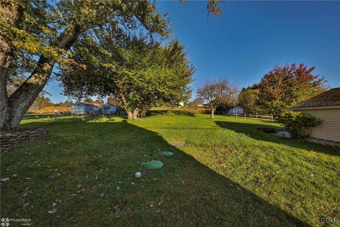 622 Hahn Road Nazareth, PA 18064 - Photo 11 of 37 a view of a golf course with a lake
