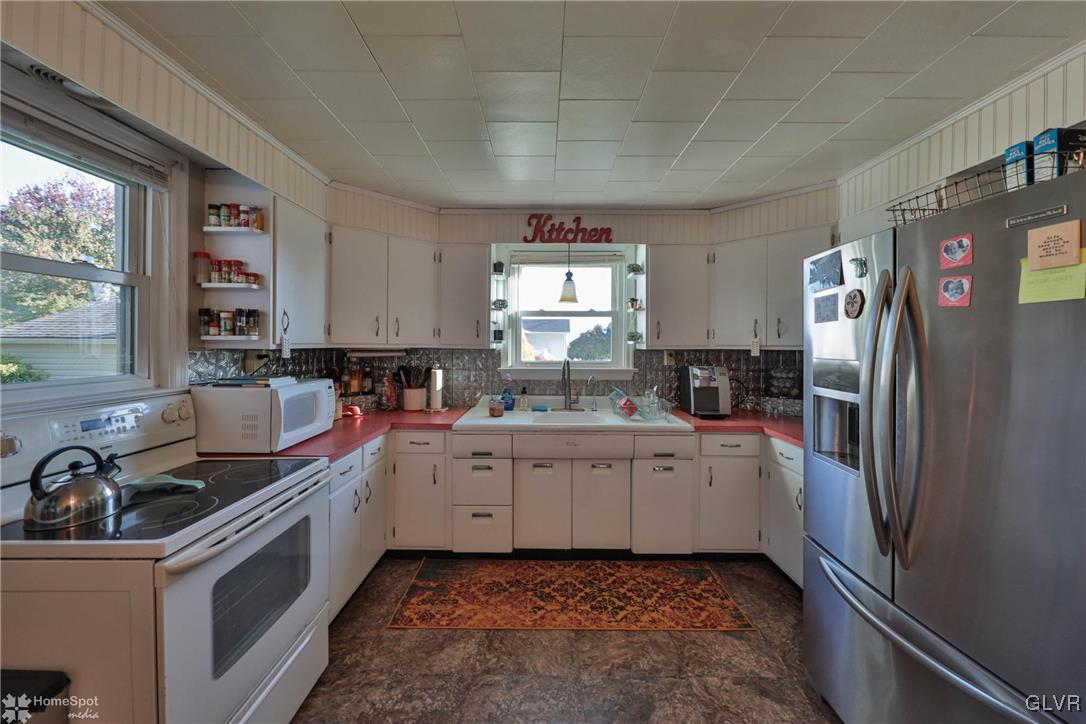 622 Hahn Road Nazareth, PA 18064 - Photo 22 of 37 a kitchen with a sink cabinets and stainless steel appliances