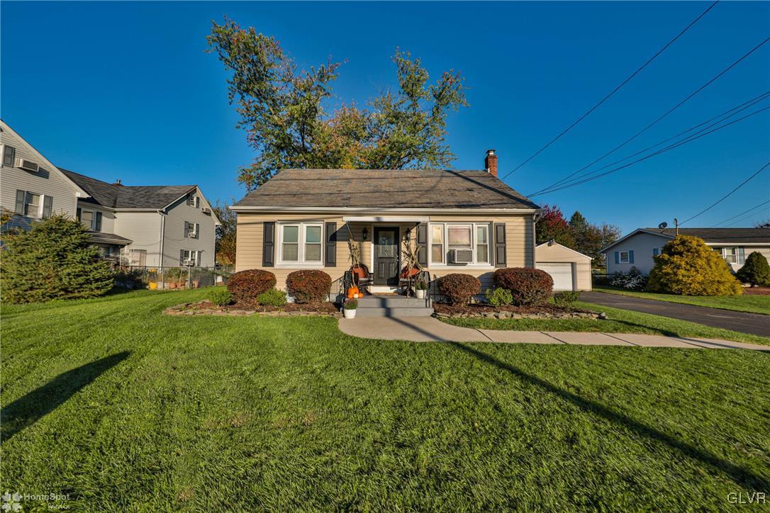 622 Hahn Road Nazareth, PA 18064 - Photo 6 of 37 a front view of a house with swimming pool garden and patio