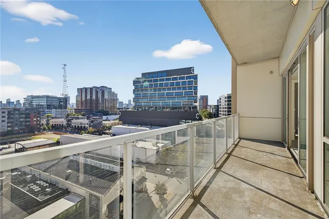 a view of a kitchen with a sink and cabinets