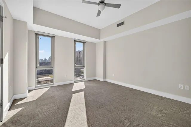 an empty room with windows