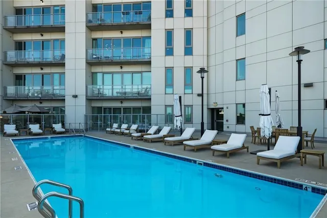 a view of a patio with swimming pool