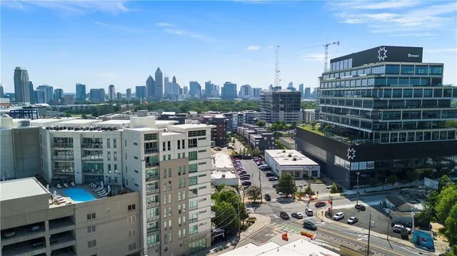a view of a city with tall buildings