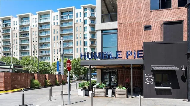 a view of a building with street sign