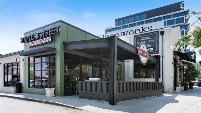 a view of street with sitting area