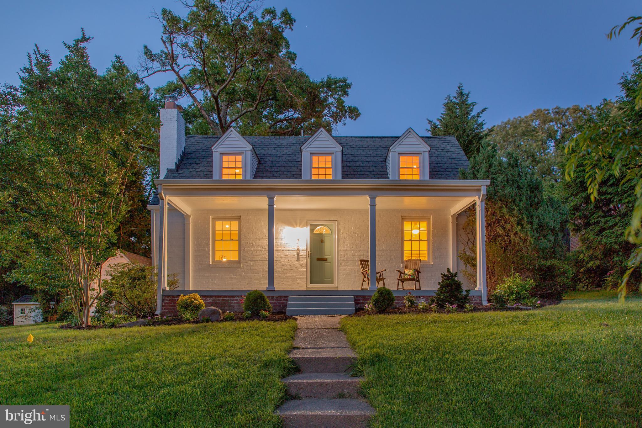 9105 Flower Avenue Silver Spring, MD 20901 - Photo 1 of 30 a front view of house and yard with green space
