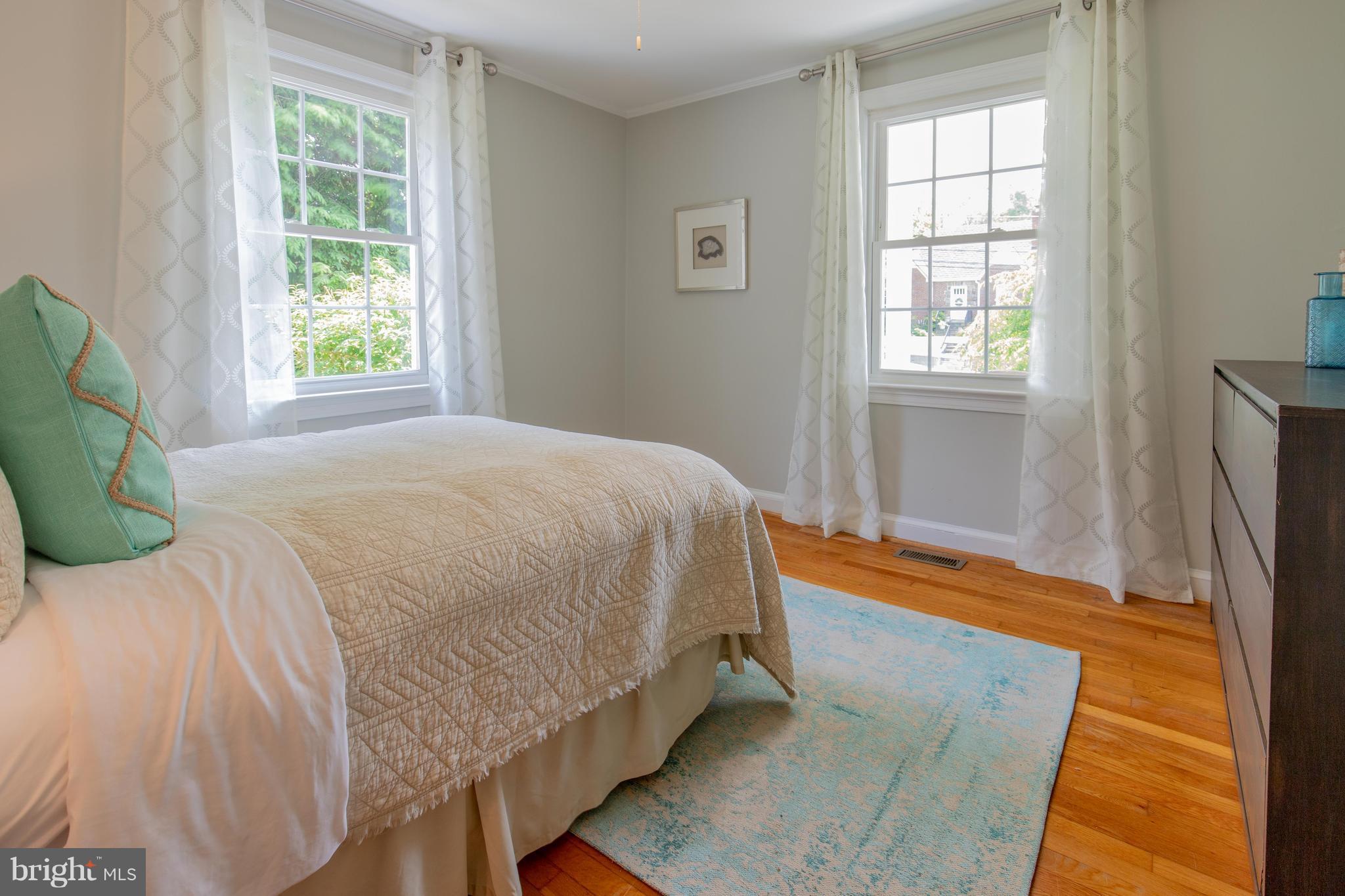 9105 Flower Avenue Silver Spring, MD 20901 - Photo 13 of 30 a bedroom with a bed and window