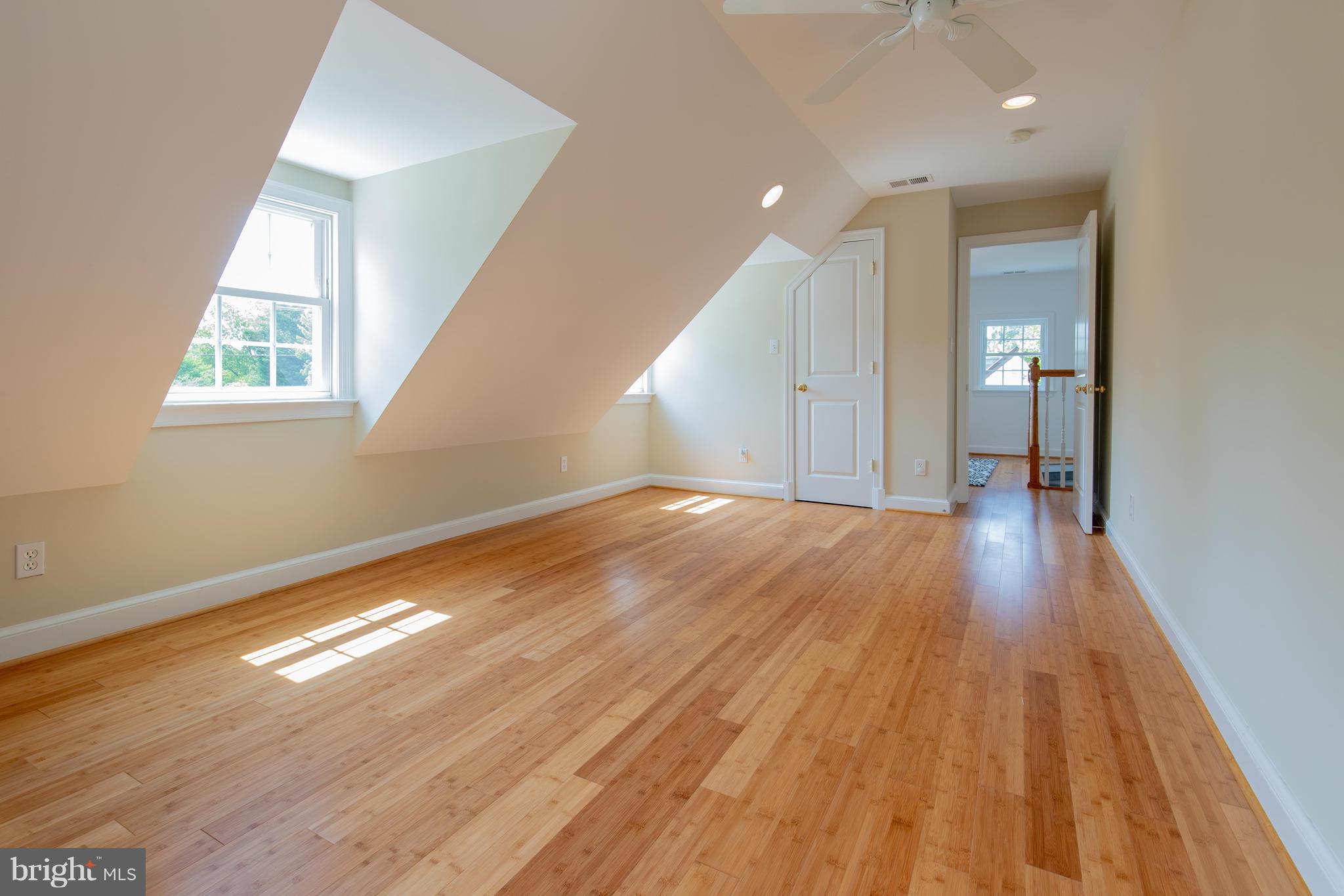 9105 Flower Avenue Silver Spring, MD 20901 - Photo 20 of 30 wooden floor in an empty room with a window