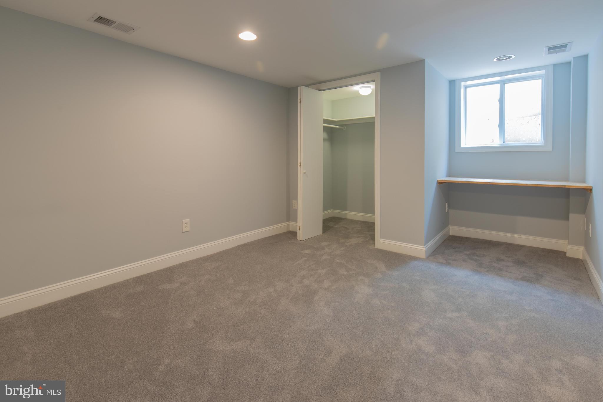 9105 Flower Avenue Silver Spring, MD 20901 - Photo 28 of 30 an empty room with windows and closet