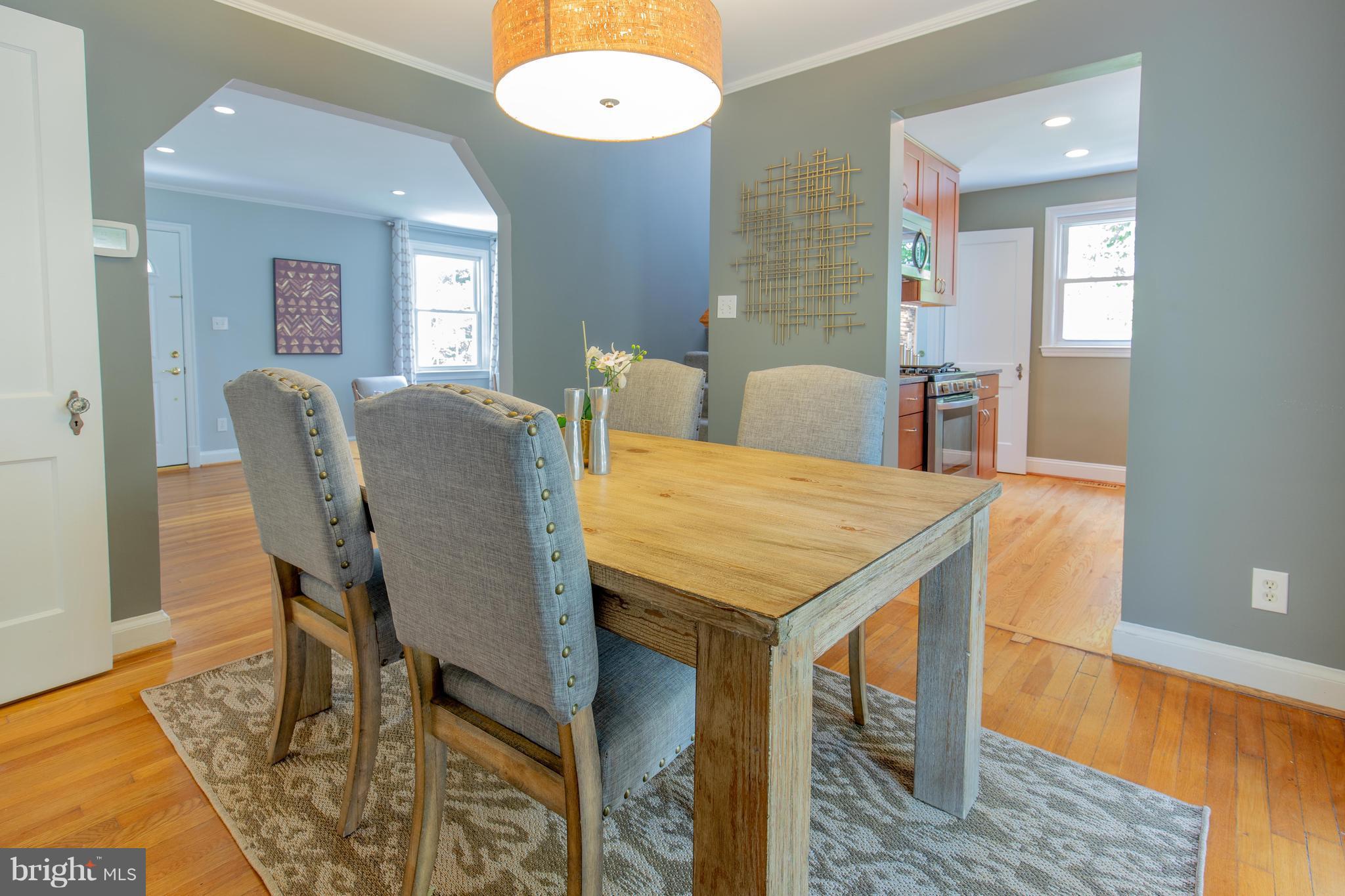 9105 Flower Avenue Silver Spring, MD 20901 - Photo 9 of 30 a dining room with furniture and window