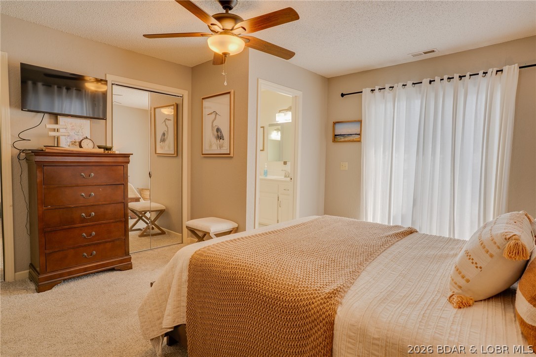 775 Winn Road, Unit 4L Osage Beach, MO 65065 - Photo 21 of 39 Master bedroom