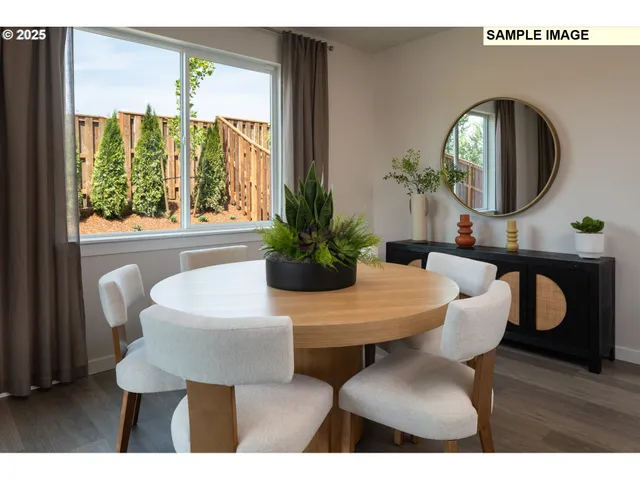 a bathroom with a double vanity sink a mirror and a shower