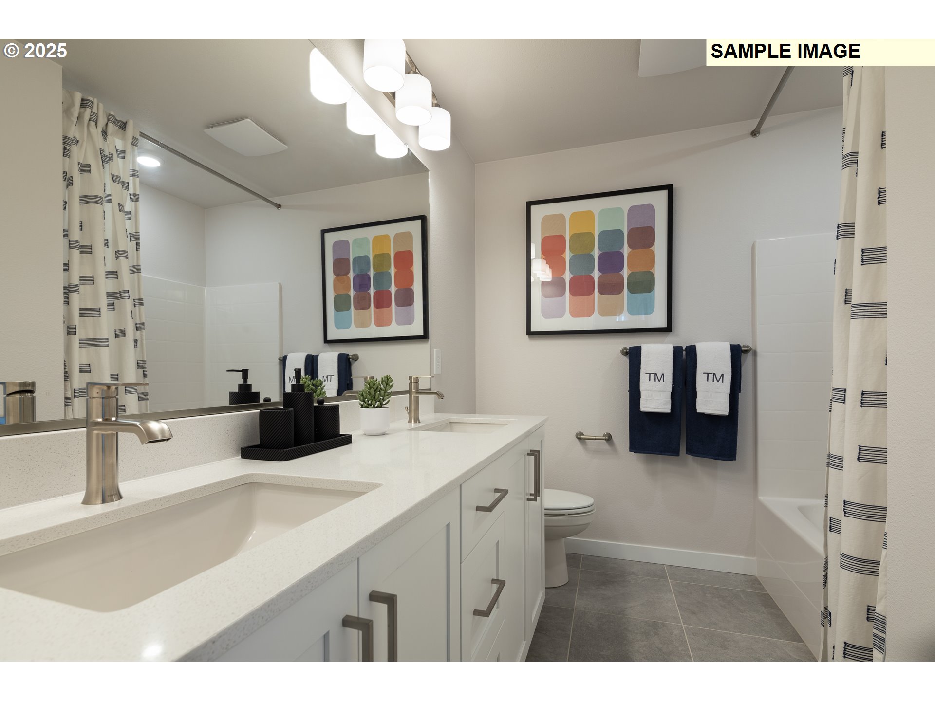 3713 Southwest 38th Street Gresham, OR 97080 - Photo 10 of 15 a bathroom with a double vanity sink a mirror and a shower