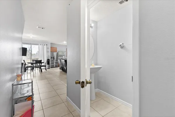 a view of a lobby with furniture and floor to ceiling window