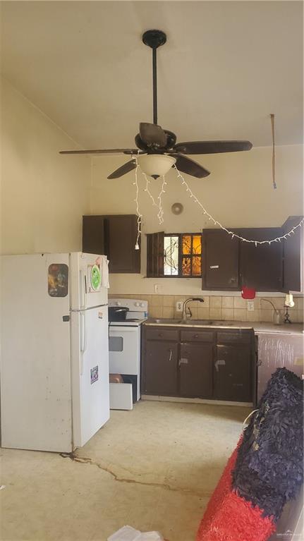 932 Jones Avenue Mercedes, TX 78570 - Photo 6 of 6 a kitchen with cabinets and window