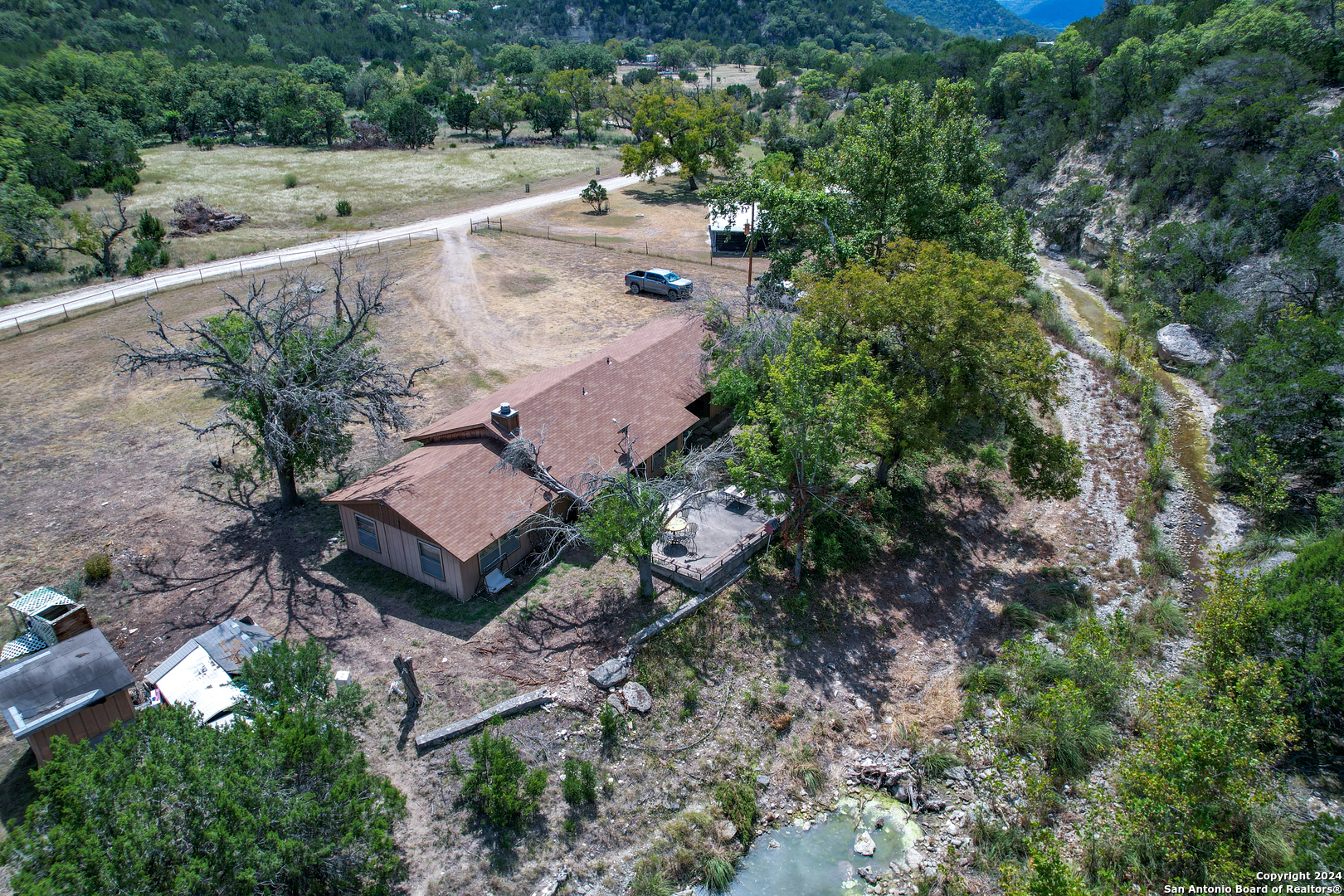2227 Mill Creek Road Leakey, TX 78873 - Photo 20 of 20 an aerial view of a house with outdoor space