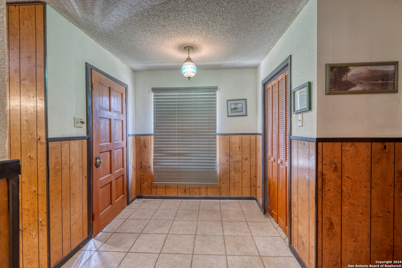 2227 Mill Creek Road Leakey, TX 78873 - Photo 7 of 20 a view of a hallway with entryway door