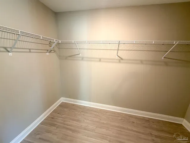 a view of a room with racks on the wall