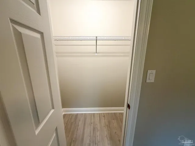 view of small space with wooden floor