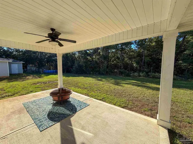 a swimming pool with a yard