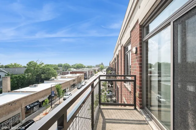 a view of balcony with furniture