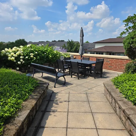 a view of a terrace with chairs