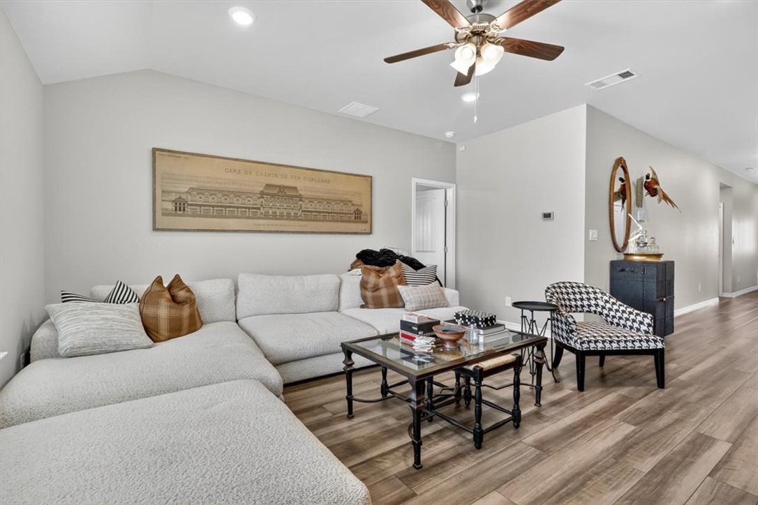 1126 Carnaby Street Corpus Christi, TX 78415 - Photo 18 of 39 a living room with furniture and wooden floor
